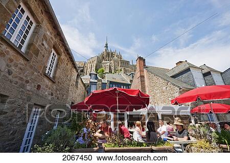 Stock Image - Restaurant In The Fortified Village And Abbey Of Mont-Saint-Michel, France. Fotosearch