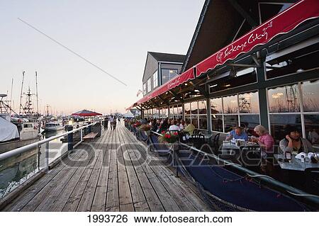 Stock Photograph - Restaurant In The Historic Fishing Village Of Steveston At Dusk, Richmond, British Columbia, Canada. Fotosearch