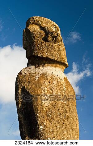 Picture - Restored Ahu Riata single moai on Hanga Piko bay; Easter Island, Chile. Fotosearch