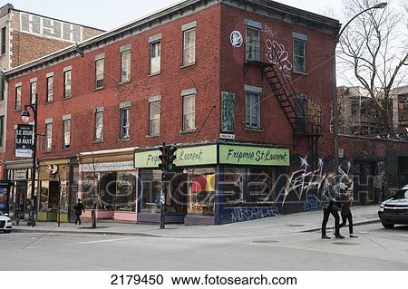 Stock Image - Retail Shops And Pedestrians On A Street; Montreal Quebec Canada. Fotosearch