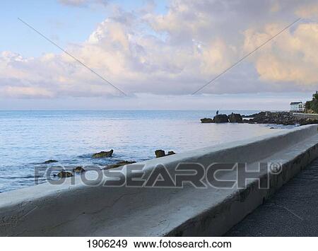 Retaining Wall Along The Coast At Elba, Tuscany, Italy View Large Photo Image Stock Photo - Retaining Wall Along The Coast At Elba, Tuscany, Italy. Fotosearch