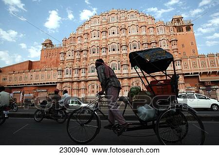 Rickshaw passing Hawa Mahal City Palace, Jaipur's most distinctive landmark, Jaipur, Rajasthan State, India. View Large Photo Image Stock Image - Rickshaw passing Hawa Mahal City Palace, Jaipur's most distinctive landmark, Jaipur, Rajasthan State, India.. Fotosearch