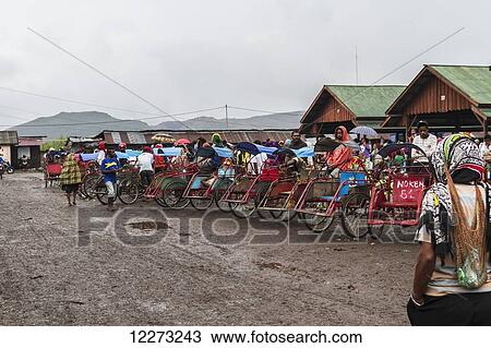 Stock Image - Rickshaws at the market, Wamena, Papua, Indonesia. Fotosearch