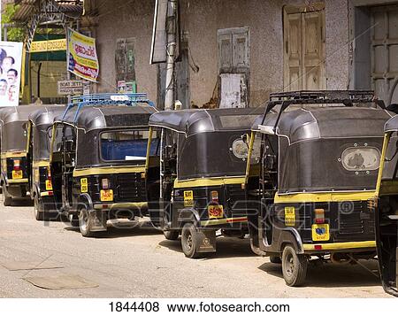 Rickshaws In Row On The Street; Cochin, Kerala, India View Large Photo Image Stock Photo - Rickshaws In Row On The Street; Cochin, Kerala, India. Fotosearch