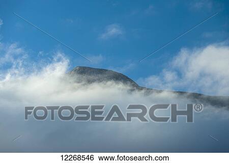 Ridge of Mount Mulanje appearing above early morning cloud; Malawi View Large Photo Image Stock Photograph - Ridge of Mount Mulanje appearing above early morning cloud; Malawi. Fotosearch