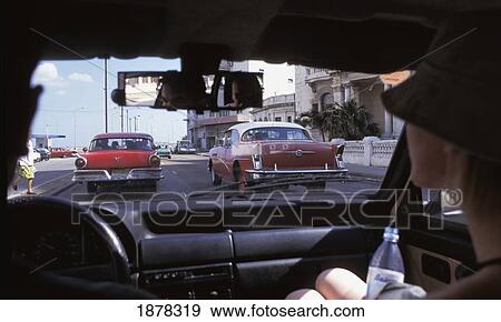 Stock Photo - Riding In A Car In Havana. Fotosearch