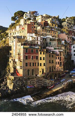 Riomaggiore at sunset, Cinque Terre; Liguria, Italy View Large Photo Image Stock Photography - Riomaggiore at sunset, Cinque Terre; Liguria, Italy. Fotosearch