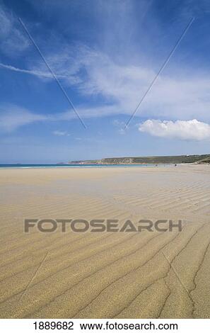 Stock Image - Ripples In The Sand On The Beach At Sennen Cove. Fotosearch