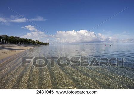 Ripples in the sand under the clear water on the coast of an island in the Indian Ocean; Mauritius View Large Photo Image Stock Photography - Ripples in the sand under the clear water on the coast of an island in the Indian Ocean; Mauritius. Fotosearch