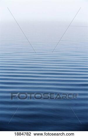 Stock Image - Ripples On A Calm Sea. Fotosearch