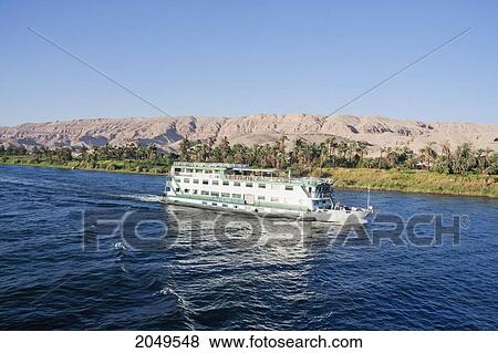 Stock Photo - River Cruise Boat On The Nile River Between Isna And Luxor, Qina, Egypt. Fotosearch