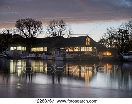 Stock Photo - River Thames at sunset; Molesey, England. Fotosearch