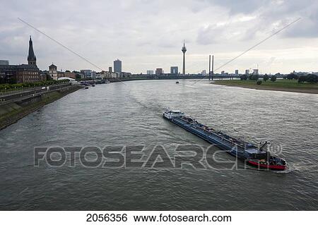 Riverboat On The Rhine River, Dusseldorf, North Rhine-Westphalia, Germany View Large Photo Image Stock Photograph - Riverboat On The Rhine River, Dusseldorf, North Rhine-Westphalia, Germany. Fotosearch