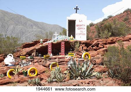 Stock Image - Road shrine to Gauchito Gil, Cuesta de Miranda Sierra de Famatina, La Rioja, Argentina. Fotosearch