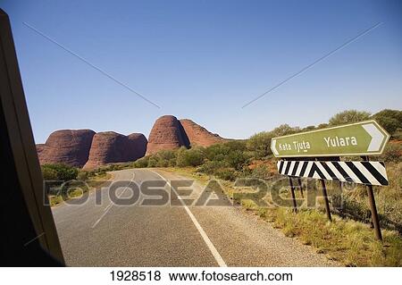 Stock Photo - Road Sign Near The Olgas, Katajuta, Northern Territory, Australia. Fotosearch