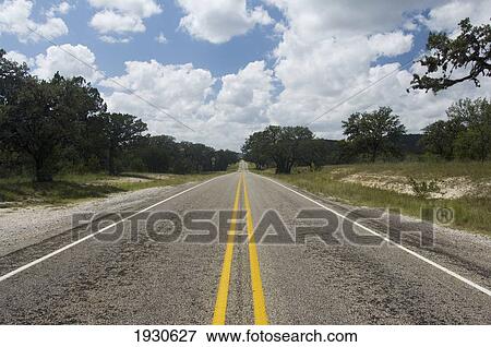 Road stretching into the distance on Route 16 in Bandera County, Texas, USA View Large Photo Image Stock Photo - Road stretching into the distance on Route 16 in Bandera County, Texas, USA. Fotosearch