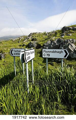 Stock Image - Roadsigns At Roghadal On Isle Of Harris. Fotosearch