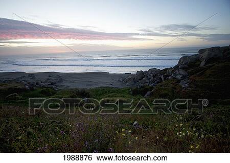 Stock Photograph - Rocas De Santo Domingo Beach At Sunset, Santo Domingo, Chile. Fotosearch
