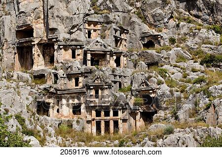 Stock Photograph - Rock-Cut Tombs Carved In A Cliff, Myra, Lycian Coast, Turkey. Fotosearch