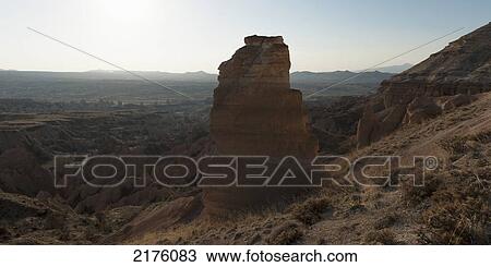 Stock Image - Rock Formation On A Rugged Landscape; Aktepe Nevsehir Turkey. Fotosearch