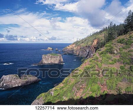 Rock formations along the coastline of an island in the pacific ocean; Norfolk Island View Large Photo Image Picture - Rock formations along the coastline of an island in the pacific ocean; Norfolk Island. Fotosearch