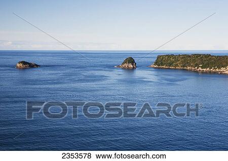 Stock Photo - Rock Formations And The Coastline Of The Coromandal Peninsula; Hahei, New Zealand. Fotosearch