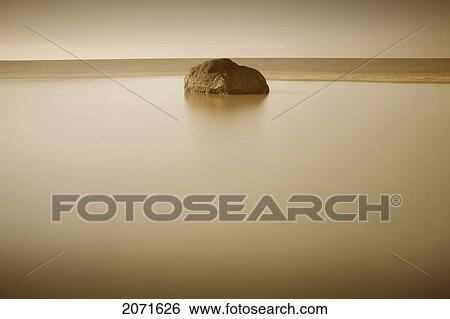 Rock In Still Water, Grand Beach, Manitoba View Large Photo Image Stock Photograph - Rock In Still Water, Grand Beach, Manitoba. Fotosearch