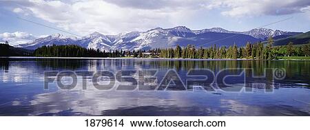 Rockies Reflected In Lake Beauvert View Large Photo Image Picture - Rockies Reflected In Lake Beauvert. Fotosearch