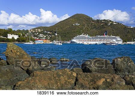 Stock Photograph - Rocks And Cruise Ship; Charlotte Amalie, St. Thomas Island, U. S. Virgin Islands. Fotosearch