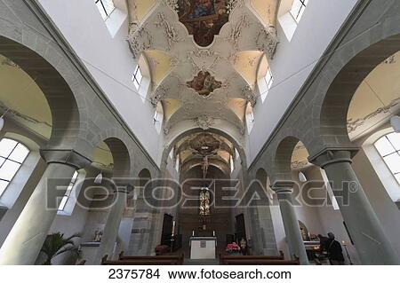 Rococo crucifixion over the main altar of the Sank Peter und Paul Kirche (Saints Peter and Paul Church), Monastic Island of Reichenau, Lake Constance, Baden-W View Large Photo Image Picture - Rococo crucifixion over the main altar of the Sank Peter und Paul Kirche (Saints Peter and Paul Church), Monastic Island of Reichenau, Lake Constance, Baden-W. Fotosearch