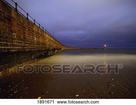 Stock Image - Roker Pier Before Dawn. Fotosearch