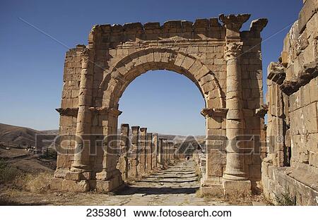 Stock Image - Roman ruins, arch and Cardo Maximus; Djemila, Algeria. Fotosearch