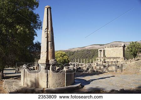 Stock Photo - Roman ruins, fountain and view towards Severan Temple; Djemila, Algeria. Fotosearch