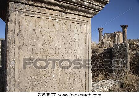 Stock Photo - Roman ruins, inscriptions along the Cardo Maximus; Djemila, Algeria. Fotosearch