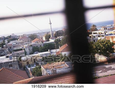 Rooftops Seen Through Windows á View Large Photo Image Stock Photo - Rooftops Seen Through Windows á. Fotosearch