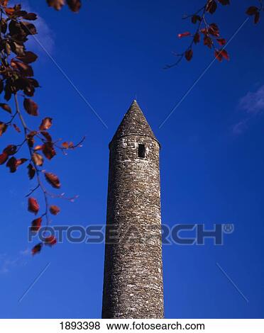 Stock Photo - Round Stone Tower At Glendalough. Fotosearch