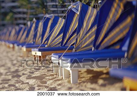 Row Beach Chairs Cabana Blue And Yellow Striped Afternoon And Soft Focus Sand View Large Photo Image Stock Photo - Row Beach Chairs Cabana Blue And Yellow Striped Afternoon And Soft Focus Sand. Fotosearch