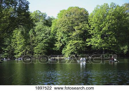 Row Boats On The Water In A Park Area; New York City, New York, United States Of America View Large Photo Image Stock Image - Row Boats On The Water In A Park Area; New York City, New York, United States Of America. Fotosearch