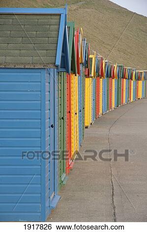 Stock Photograph - Row Of Colorful Beach Huts. Fotosearch