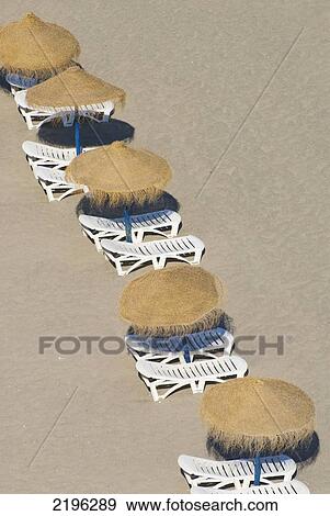 Stock Photo - Rows Of Parasols On The Beach Of Torremolinos, Andalucia, Spain.. Fotosearch