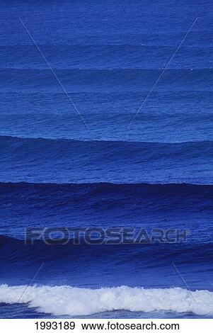 Rows Of Rolling Dark Blue Small Waves. View Large Photo Image Stock Photo - Rows Of Rolling Dark Blue Small Waves.. Fotosearch