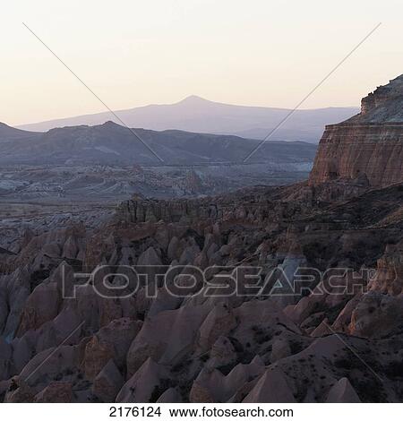 Picture - Rugged Landscape At Sunrise; Aktepe Nevsehir Turkey. Fotosearch