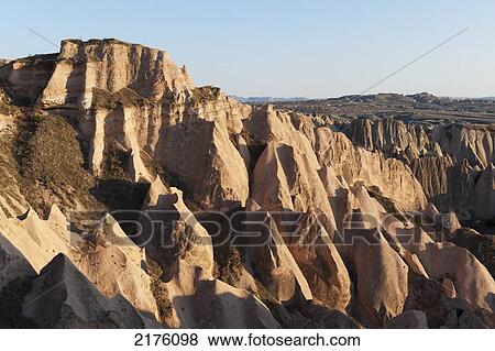 Stock Photo - Rugged Rock Formations; Aktepe Nevsehir Turkey. Fotosearch