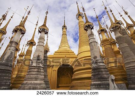 Stock Photo - Ruined pagodas at Shwe Inn Thein Paya above Inthein on Inle Lake; Myanmar. Fotosearch
