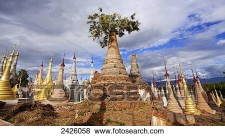 Ruined pagodas at Shwe Inn Thein Paya above Inthein on Inle Lake; Myanmar View Large Photo Image Stock Photo - Ruined pagodas at Shwe Inn Thein Paya above Inthein on Inle Lake; Myanmar. Fotosearch