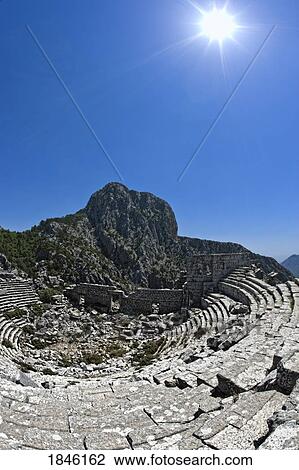 Stock Image - Ruins Of Ancient Amphitheatre; Termessos, Antalya, Turkey. Fotosearch