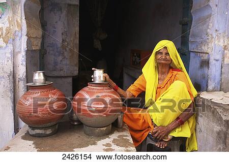 Rural Rajasthan water seller in village bazaar; Rajasthan, India View Large Photo Image Picture - Rural Rajasthan water seller in village bazaar; Rajasthan, India. Fotosearch