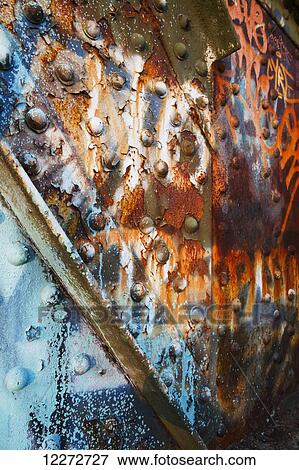 Stock Photo - Rust and graffiti on the railway bridge over the Seymour River, North Vancouver, British Columbia, Canada. Fotosearch