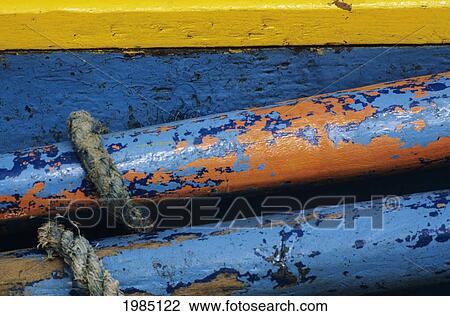 Stock Image - Rustic Boat Parts, Detail Of Wooden Structure And Colorful Peeling Paint.. Fotosearch