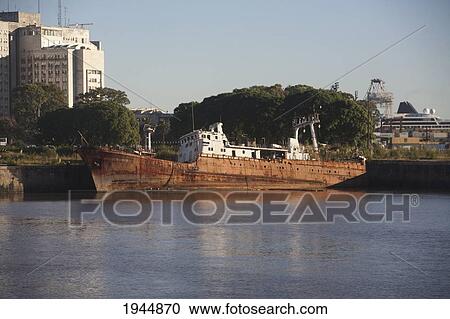 Stock Image - Rusting ship in the Darsena Norte, Buenos Aires, Capital Federal, Argentina. Fotosearch
